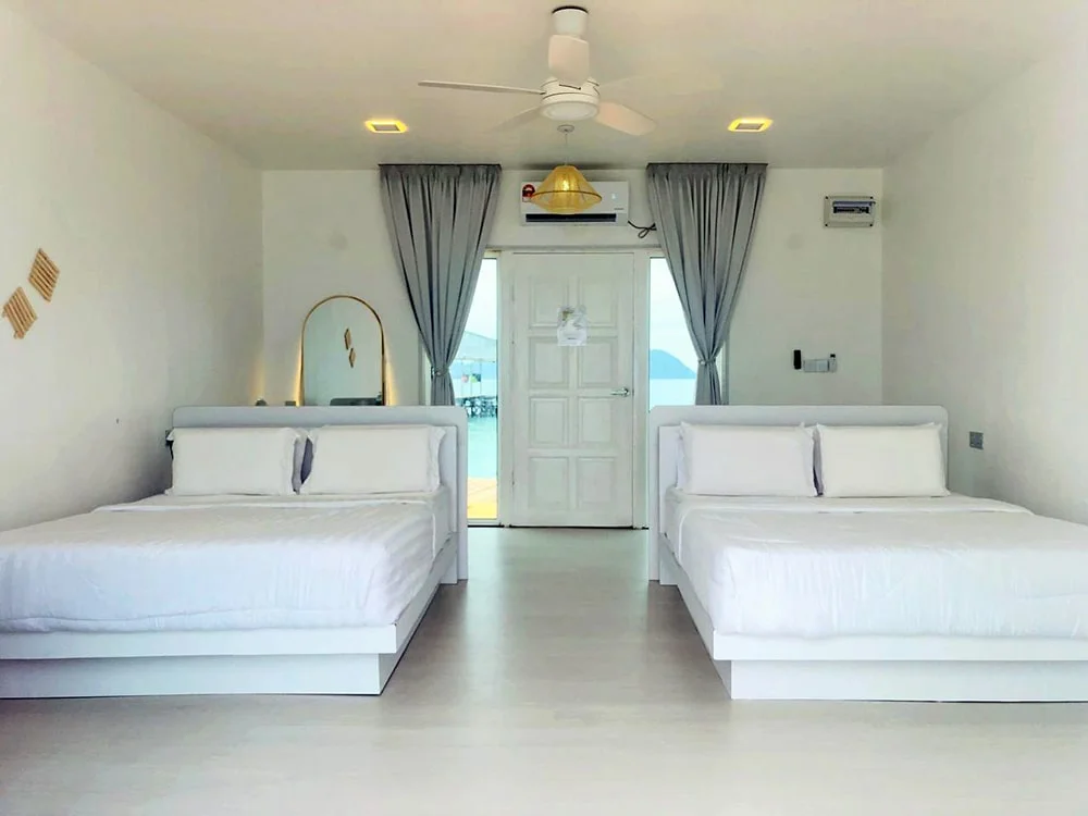 Window view with white furniture and ocean view